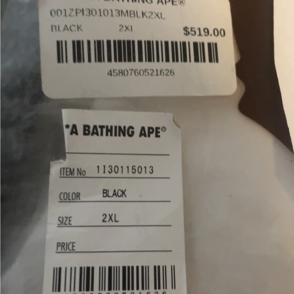 Text code camo bape hoodie.